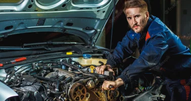 mechanic-working-car-motor-auto-repair-service-center_98890-512.webp